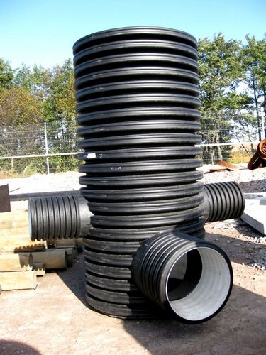Дренажные трубы для отвода грунтовых вод: критерии выбора и монтаж