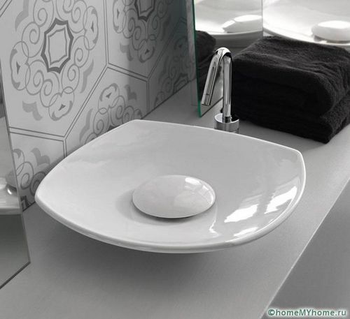 Раковина для ванны накладная на столешницу: виды и выбор